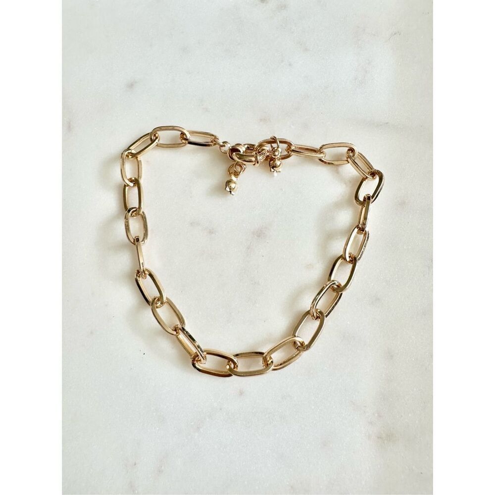 Gold colored chain link bracelet ￼